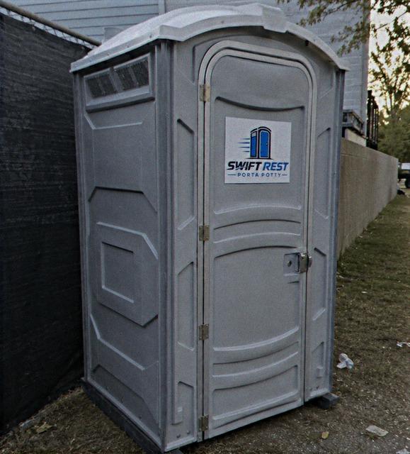 Deluxe portable restroom rental with interior sink